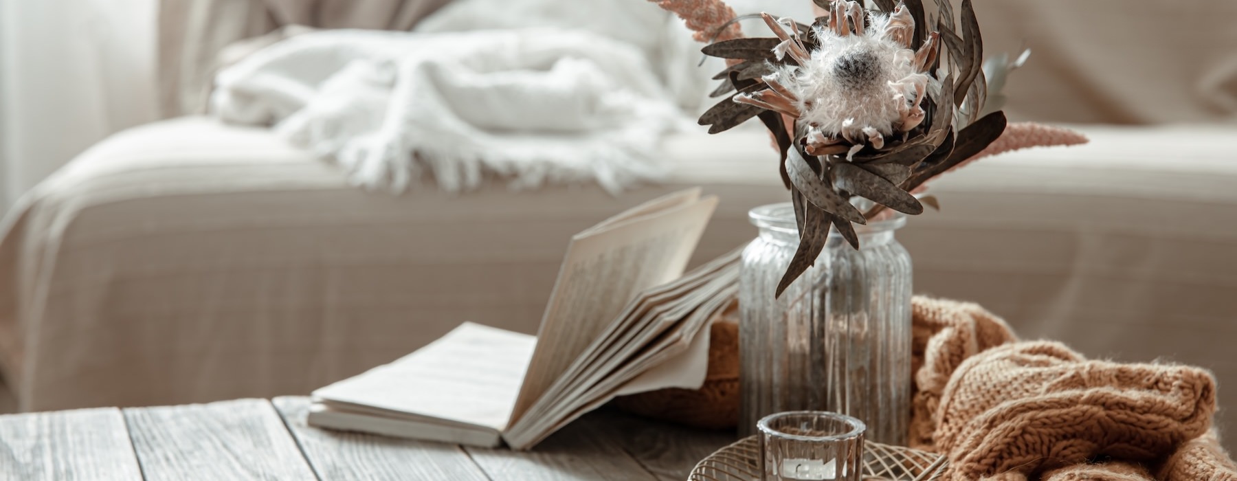a living room with a couch and a table
